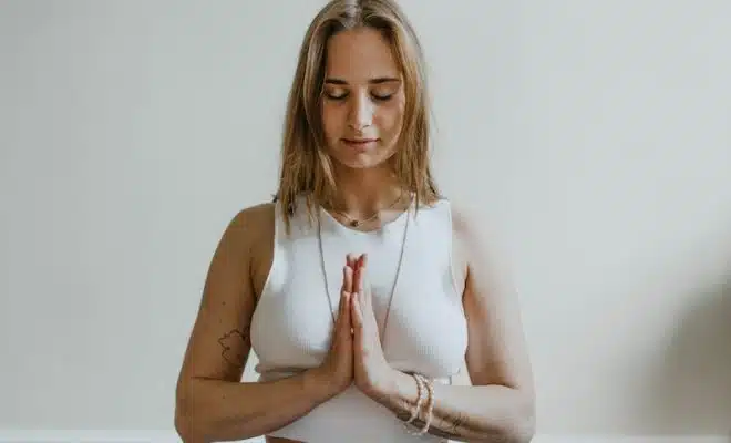 Woman Doing Yoga Inside A Room