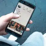 person holding Android smartphone